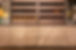 Timber wine storage drawers above stone cabinet panels